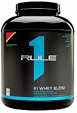 Białko serwatkowe Truskawka z bananem - Rule One R1 Whey Blend Strawberry Banana — Zdjęcie N2