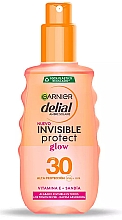 Spray do opalania - Garnier Delial Ambre Solaire Invisible Protect Glow SPF30 Spray — Zdjęcie N1