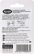 Miętowa nić dentystyczna z fluorem, 100 m - Beauty Formulas Active Oral Care Mint Waxed Fluoride Dental Floss — Zdjęcie N2