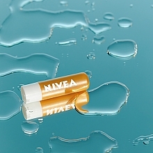 Pielęgnująca pomadka do ust SPF 30 - NIVEA Sun Protect Lip Balm SPF 30 — Zdjęcie N6