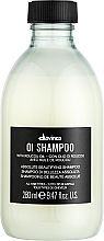 Kup Upiększający szampon do wszystkich rodzajów włosów - Davines Oi Absolute Beautifying Shampoo With Roucou Oil