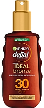 Kup Olejek przeciwsłoneczny w sprayu - Garnier Delial Ambre Solaire Ideal Bronze Protective Oil Spray SPF30