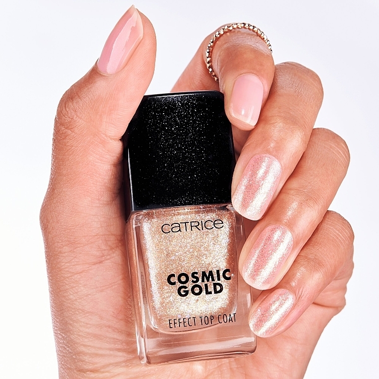 Top coat do paznokci z efektem kosmicznego złota - Catrice Cosmic Gold Effect Celestial Light Top Coat — Zdjęcie N6