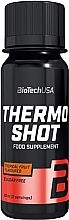 Spalacz tłuszczu w płynie z owoców tropikalnych - BioTechUSA Thermo Shot Food Supplement — Zdjęcie N1