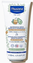 Kup Szampon odżywczy do włosów falowanych - Mustela Shampoo Creme Nutriente&Districante