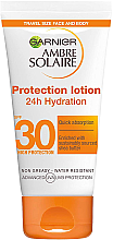 Kup Przeciwsłoneczny balsam nawilżający do twarzy i ciała SPF 30 - Garnier Ambre Solaire Protection Lotion Face & Body