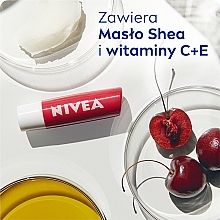 PRZECENA! Pielęgnująca pomadka do ust Wiśnia - NIVEA Fruity Shine Cherry Lip Balm * — Zdjęcie N5