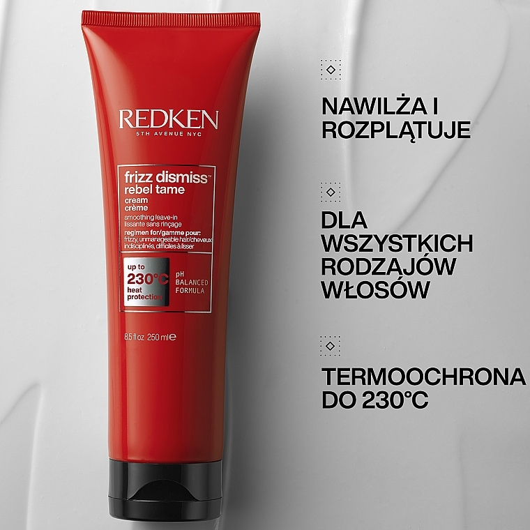 Wygładzający krem termoochronny przeciw puszeniu się włosów - Redken Frizz Dismiss Rebel Tame — Zdjęcie N2