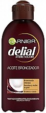 Kup Intensywny olejek przyspieszający opalanie o zapachu kokosowym - Garnier Delial Ambre Solaire Intense Suntan Coco Oil