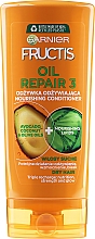 Odżywka wzmacniająca do włosów suchych i łamliwych - Garnier Fructis Oil Repair 3 Conditioner — Zdjęcie N1