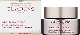 Krem odmładzający na dzień - Clarins Nutri-Lumière Day Cream  — Zdjęcie N1
