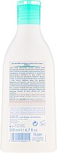 Oczyszczająca emulsja do kąpieli dla dzieci od pierwszych dni życia - Biolane Baby Essential Cleansing Emulsion — Zdjęcie N2