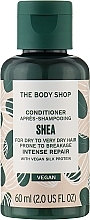 Kup Intensywnie odbudowująca odżywka do włosów suchych - The Body Shop Shea Intense Repair Conditioner