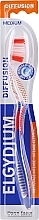 Szczoteczka do zębów Diffusion, średnia, pomarańczowa - Elgydium Diffusion Medium Toothbrush — Zdjęcie N1