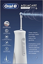 Irygator z technologią Oxyjet, biało-szary - Oral-B Pro-Expert Power Oral Care AquaCare Series 6 MDH20.026.3 — Zdjęcie N9