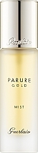 Kup Utrwalacz makijażu dodający skórze blasku - Guerlain Parure Gold Radiant Setting Spray
