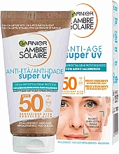 Krem przeciwsłoneczny z kwasem hialuronowym - Garnier Ambre Solaire Anti-Age Super UV SPF50 — Zdjęcie N1