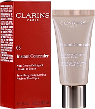 Kup Kremowy korektor pod oczy - Clarins Instant Concealer