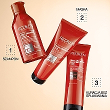 Wygładzający krem termoochronny przeciw puszeniu się włosów - Redken Frizz Dismiss Rebel Tame — Zdjęcie N5