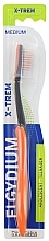 Szczoteczka do zębów dla nastolatków "X-Trem" średnia, pomarańczowa - Elgydium X-Trem Medium Toothbrush — Zdjęcie N1