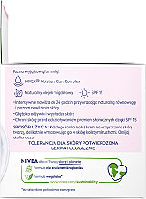 Krem odżywczy na dzień 24h Nawilżenia - NIVEA Moisturizing Day Cream Nourishing For Dry And Sensitive Skin — Zdjęcie N4