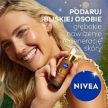 Zestaw - NIVEA Q10 Elegance (day/cr/50ml + f/ser/30ml + bag) — Zdjęcie N3