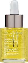 Olejek pielęgnacyjny do cery tłustej i mieszanej - Clarins Lotus Face Treatment Oil — Zdjęcie N1