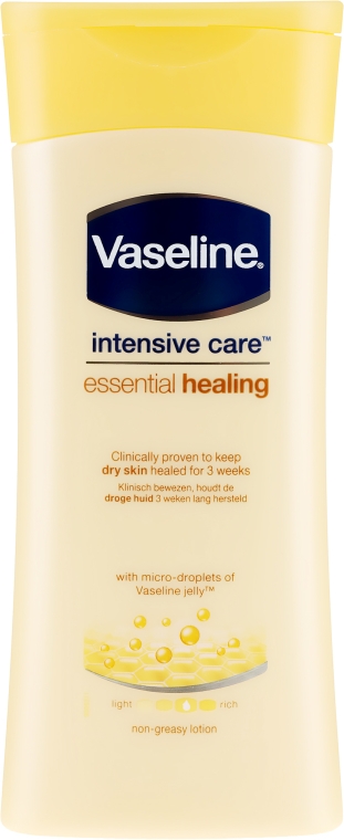 Nawilżający lotion do ciała - Vaseline Intensive Care Essential Healing Lotion — Zdjęcie N1