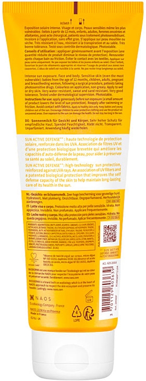 Nawilżający balsam przeciwsłoneczny do twarzy i ciała SPF 50+ - Bioderma Photoderm Lait Ultra Moisturising Lotion Sensitive Skin SPF 50+ — Zdjęcie N2