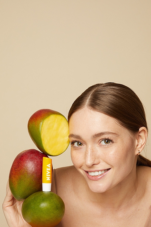 Nawilżająca pomadka do ust Mango - NIVEA Mango Shine Lip Balm — Zdjęcie N4