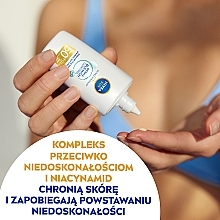 Fluid do twarzy SPF 50 - NIVEA SUN UV Face Derma Skin Clear — Zdjęcie N4