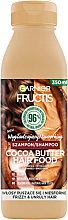 Kup Wygładzający szampon do włosów puszących się i niesfornych - Garnier Fructis Cocoa Butter Hair Food Shampoo