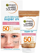 Krem przeciwsłoneczny do twarzy - Garnier Ambre Solaire Anti-Dryness Super UV Protection Cream With Glycerin SPF50 — Zdjęcie N1