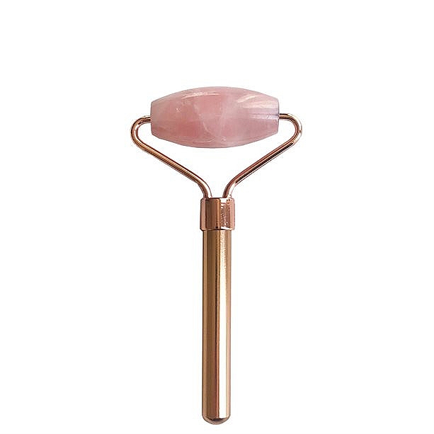 Roller do masażu twarzy z różowego kwarcu - Avon — Zdjęcie N1