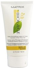 Wygładzający krem pomagający kontrolować nieposłuszne włosy - Biolage Smooththerapie Deep Smoothing Leave-In Cream — Zdjęcie N1