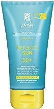 Krem matujący z filtrem przeciwsłonecznym - BioNike Defence Sun SPF50 Mattifying Face Cream — Zdjęcie N1