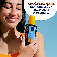 Olejek w sprayu aktywujący naturalną opaleniznę SPF 20 - NIVEA SUN Protect & Bronze — Zdjęcie N4