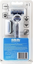 Maszynka do golenia z 2 wymiennymi kasetami - Gillette SkinGuard Sensitive — Zdjęcie N2