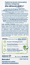 Fluid do twarzy SPF 50 - NIVEA SUN UV Face Triple Protect — Zdjęcie N2