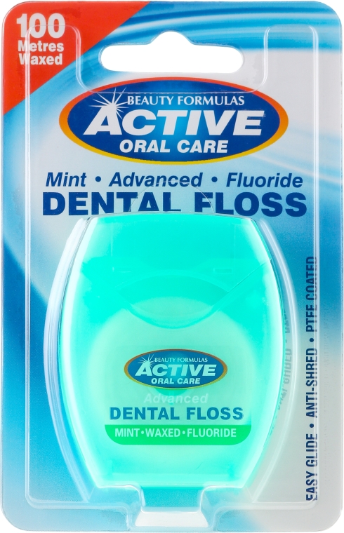 Miętowa nić dentystyczna z fluorem, 100 m - Beauty Formulas Active Oral Care Mint Waxed Fluoride Dental Floss — Zdjęcie N1
