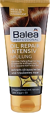 Kup Intensywna odżywka rewitalizująca - Balea Oil Repair Intensiv Conditioner Balm