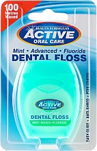 Kup Miętowa nić dentystyczna z fluorem, 100 m - Beauty Formulas Active Oral Care Mint Waxed Fluoride Dental Floss