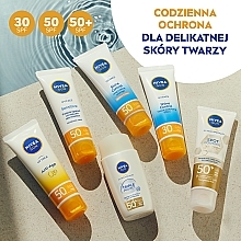 Fluid do twarzy SPF 50 - NIVEA SUN UV Face Triple Protect — Zdjęcie N8